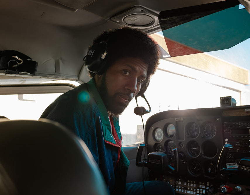 Pilot wears the Alpha Aviation Headset