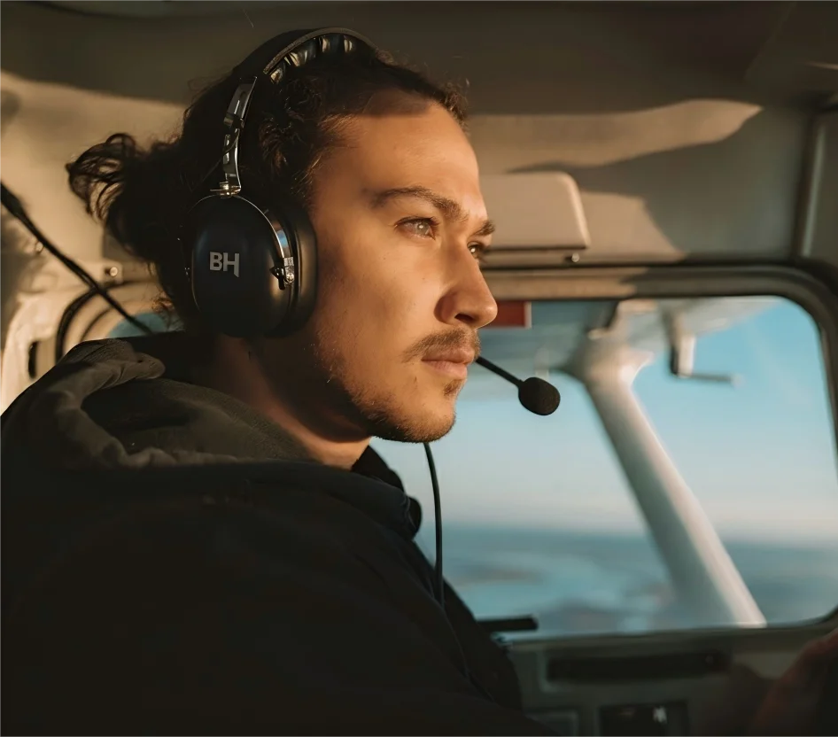 Side View of Male pilot wears the BH Alpha Lite Aviation Headset